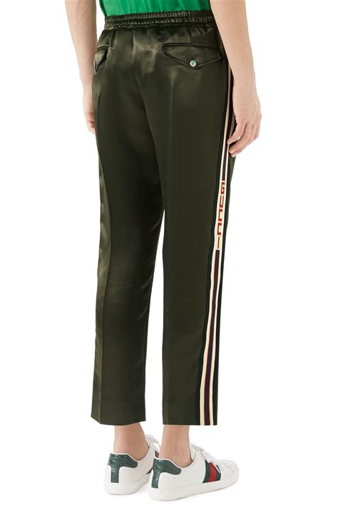 gucci track pants green|Gucci jogging pants.